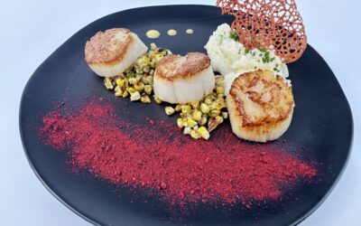 Cuisine’s Seared Scallops with Creamed Leek Risotto.  Learn the secrets and the back story of this iconic dish.